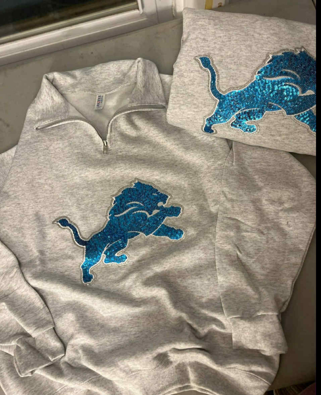Lion quarter zip